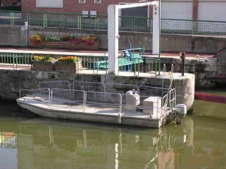Lock and workboat in Maubeuge, France