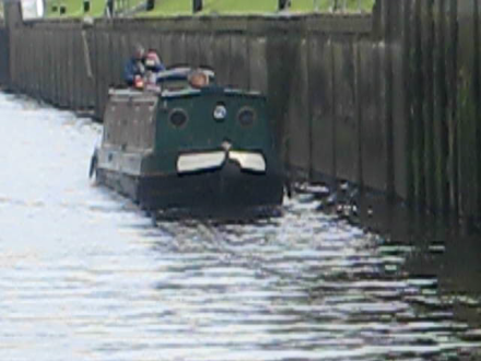 Narrowboat leaving lock