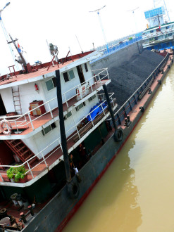 Barge in the locks of the Gezhouba Dam, Yangtze River, Yichang, Hubei, China