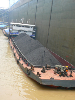 Coal barge in the locks of the Gezhouba Dam, Yangtze River, Yichang, Hubei, China